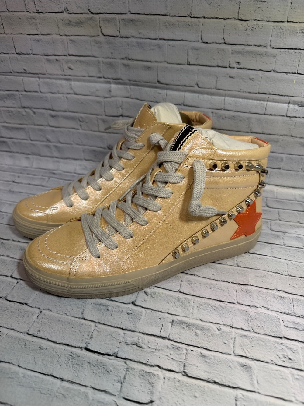 ShuShop Beige High-Top Sneakers with Orange Star & Studs